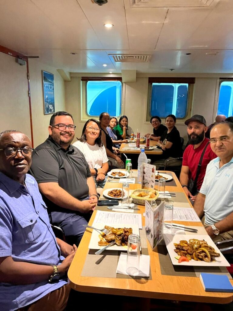 Mission team fellowship and a shared meal while traveling.